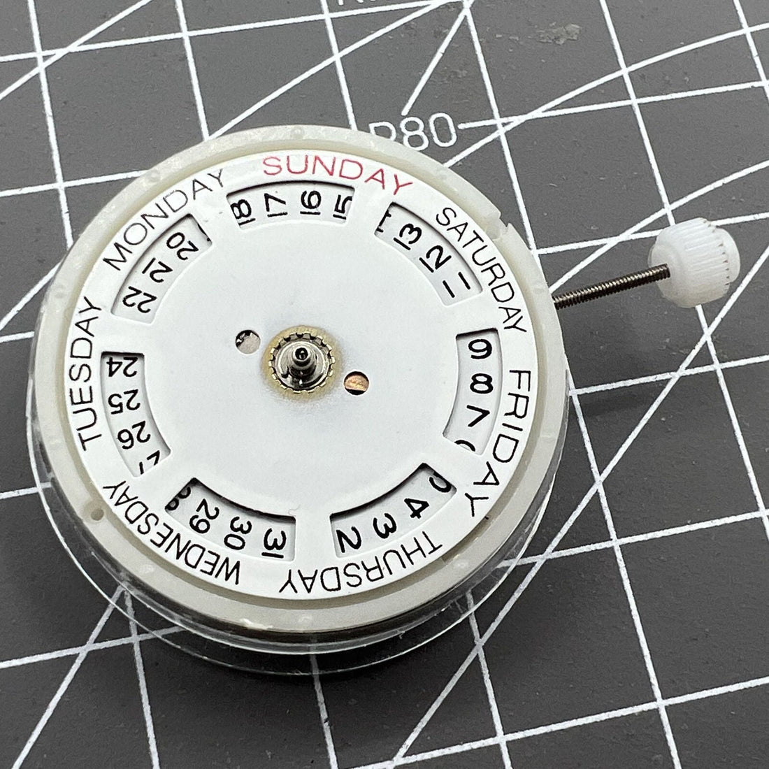 Silver DG2813 automatic watch movement with day-date function, precise replacement for mechanical watches.