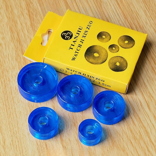 Set of 5 blue watch movement pads, 2-3.5cm, for precise watch repair.