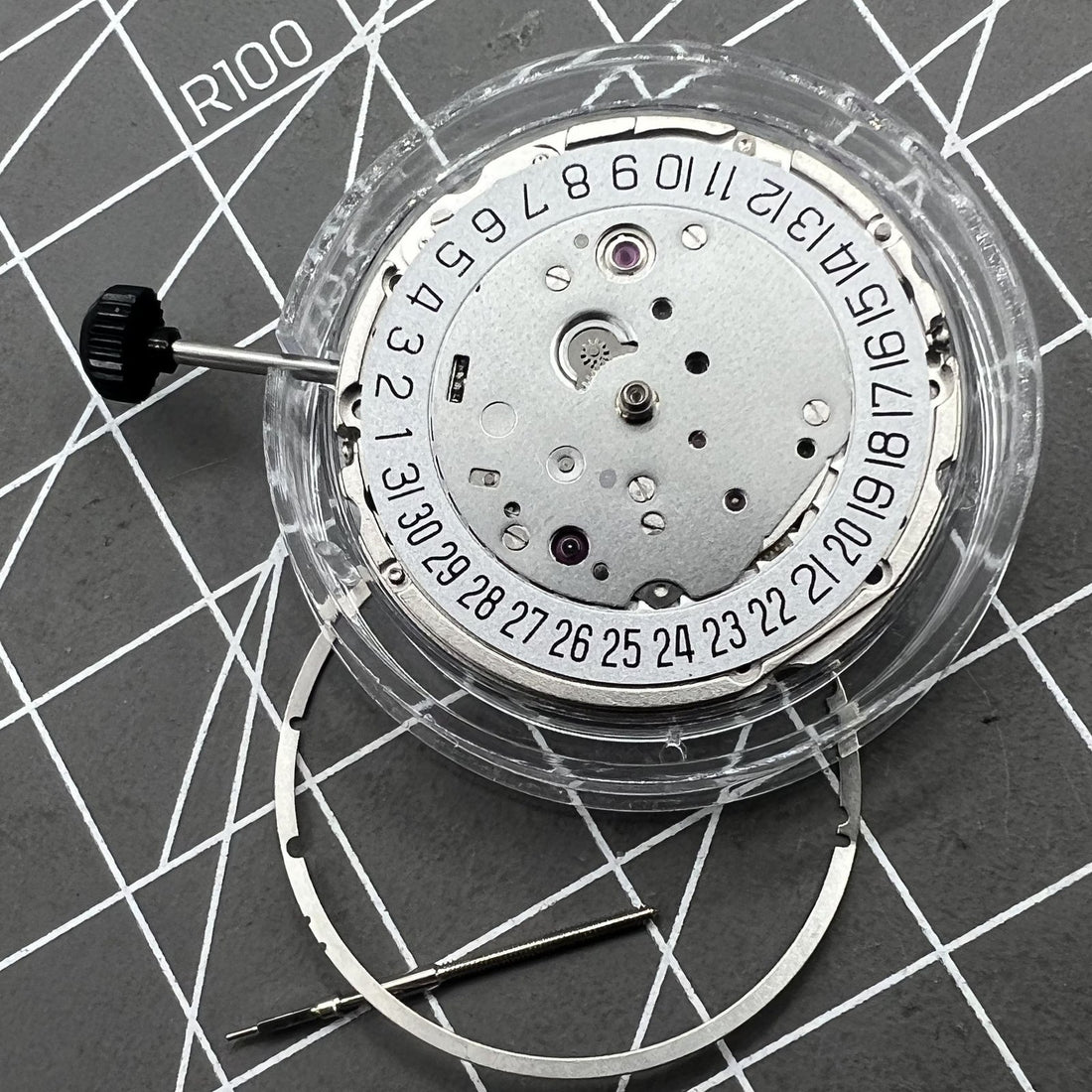 Miyota 9019 automatic watch movement with mechanical date display at 6 o'clock, precise and reliable.
