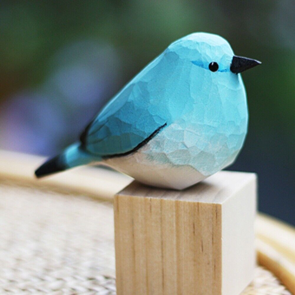 Handmade mountain bluebird wooden figurine, detailed collectible decor for nature lovers.