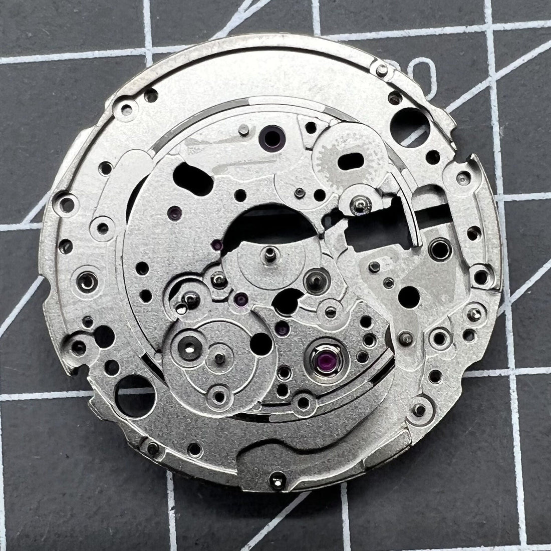 Main wheel bridge splint for Miyota 9015 watch movement, durable and precise repair part.
