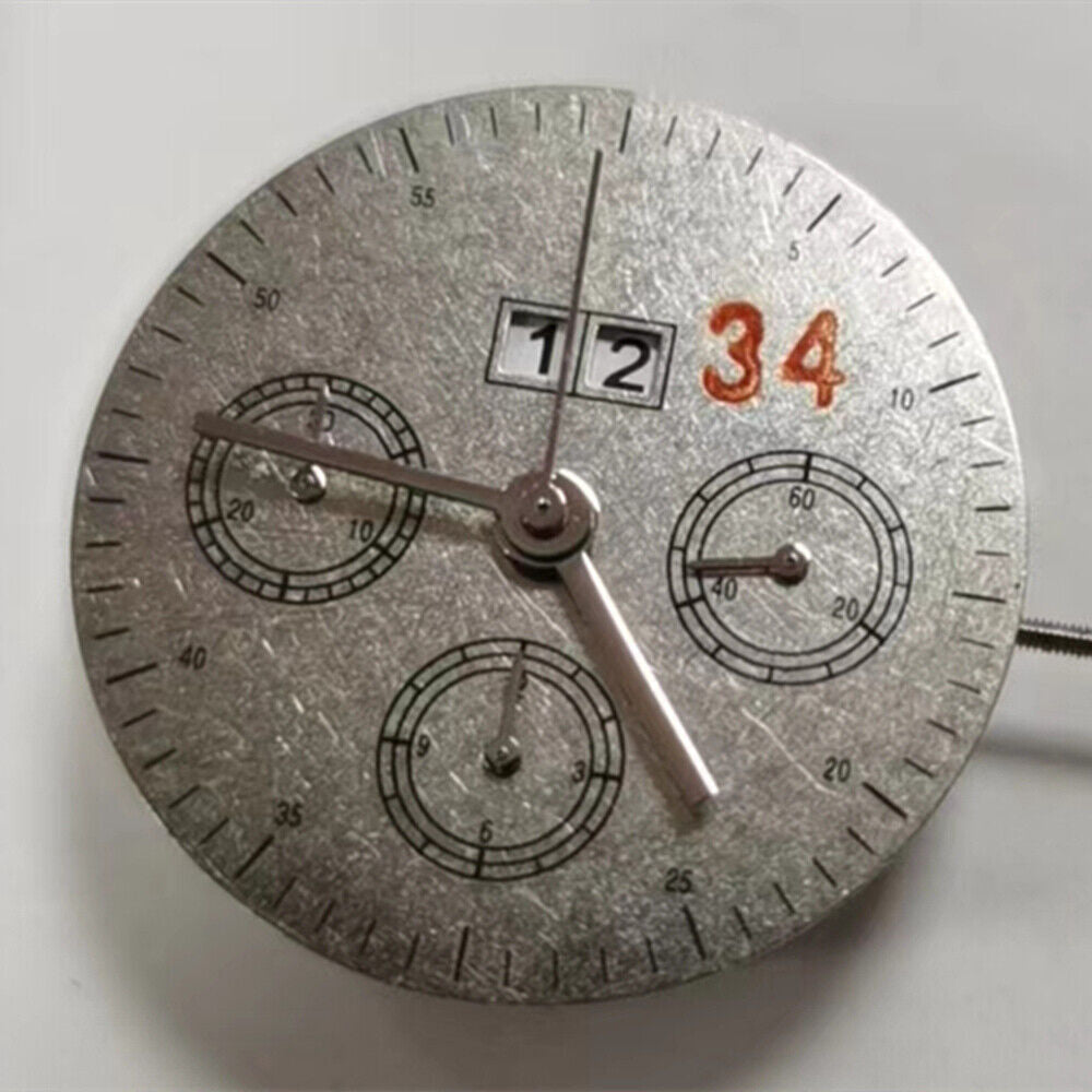 Dandong 7750 chronograph watch movement with 3 hands, small seconds, date at 12, detailed close-up.