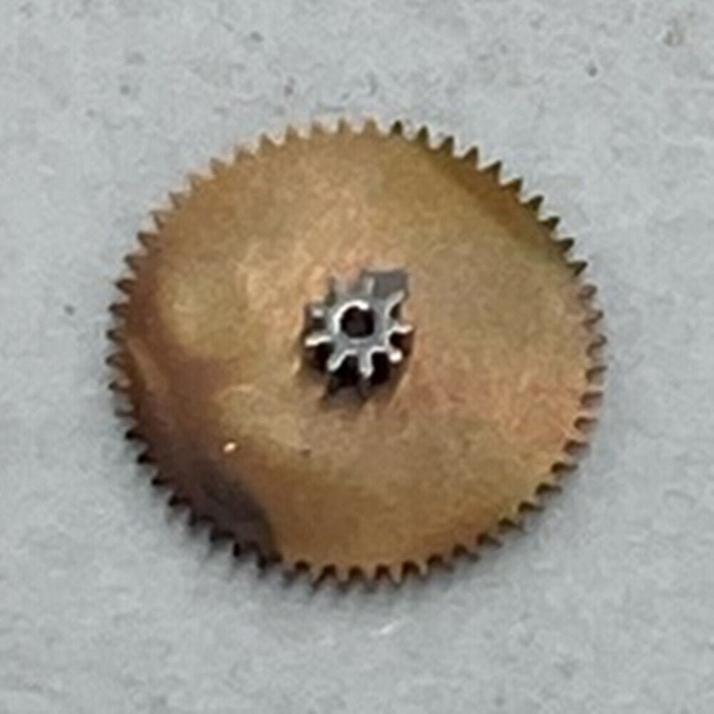 Ratchet wheel component for ETA2671 watch movement, disassembled, essential for precise gear driving.