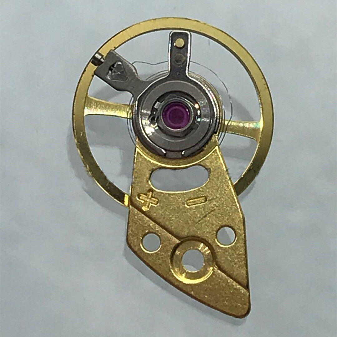 Golden Japan-made balance wheel with splint for Miyota 8N24 watch movement, precise timekeeping accessory.