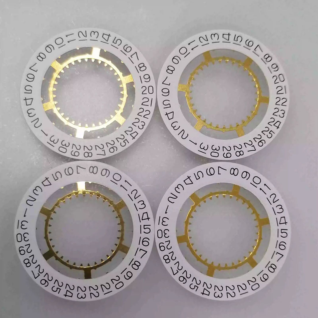 Genuine Swiss white date disk wheel for Ronda 715 movement, date display at 3 o'clock position.