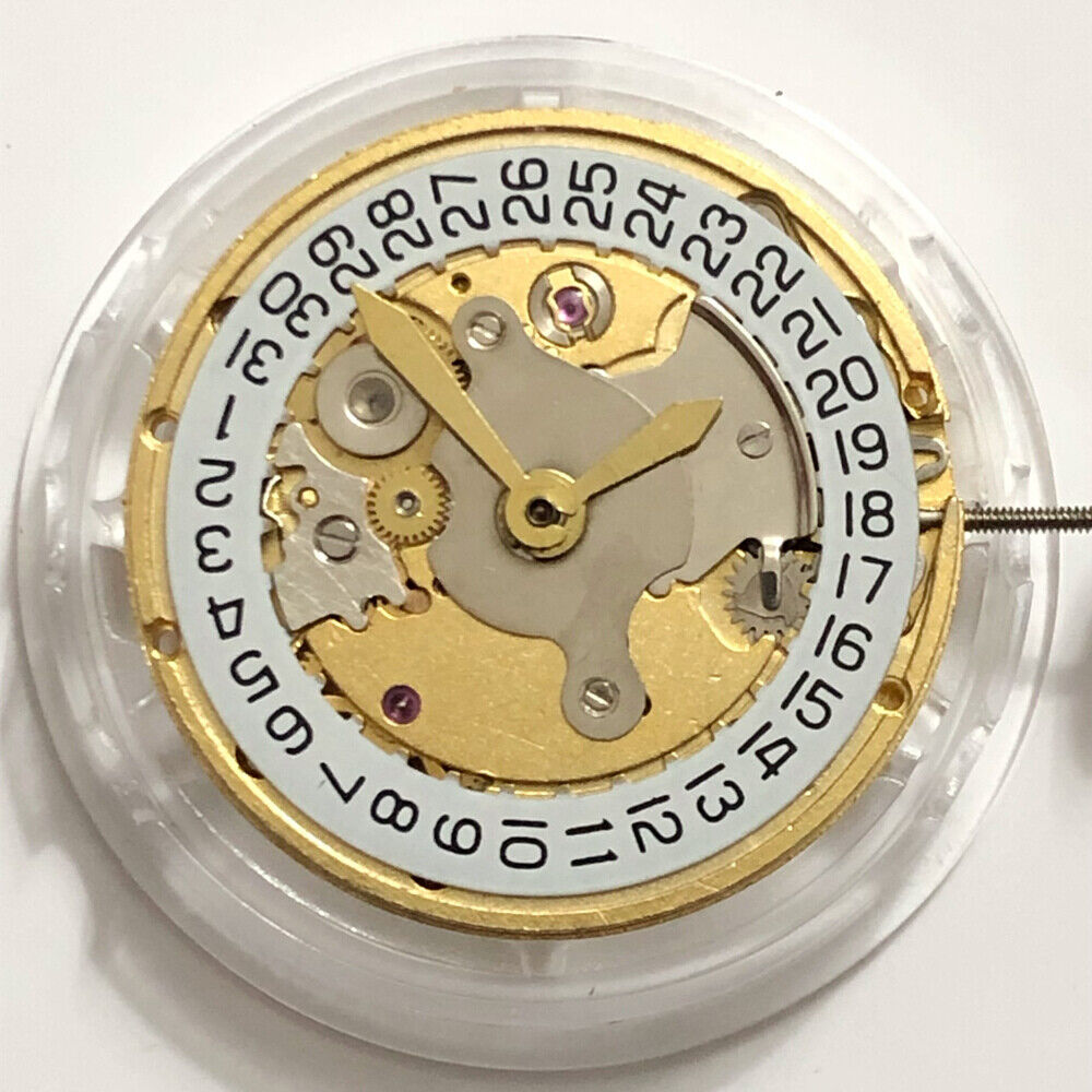 SHANGHAI 2824 automatic mechanical watch movement with golden finish and date display at 3 o'clock.