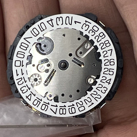 Hattori Epson VR33B quartz watch movement, precision Japan-made component for timepieces.