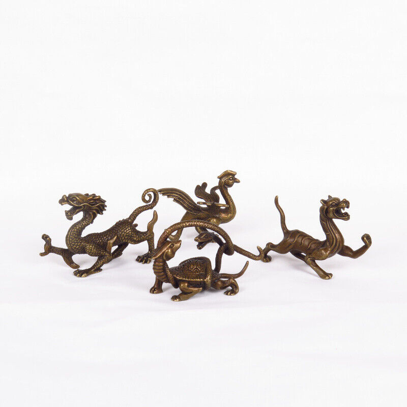 Solid copper hand-carved Dragon, White Tiger, Suzaku, and Basalt Four Spirits figurines, detailed craftsmanship ideal for collectors and decor.