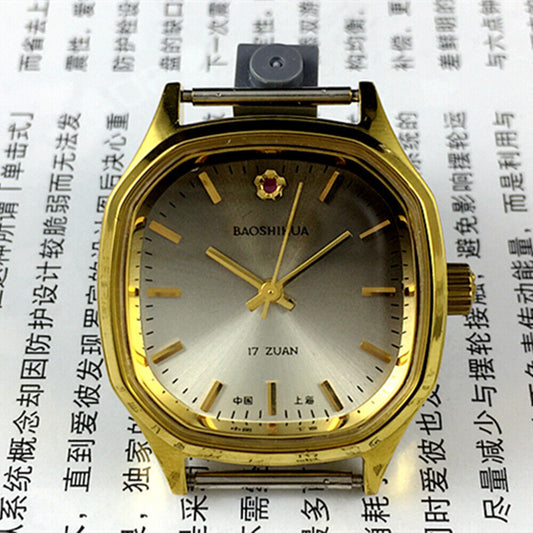 32mm Shanghai brand manual watch with golden nail markers, brown dial, and octagonal case design.