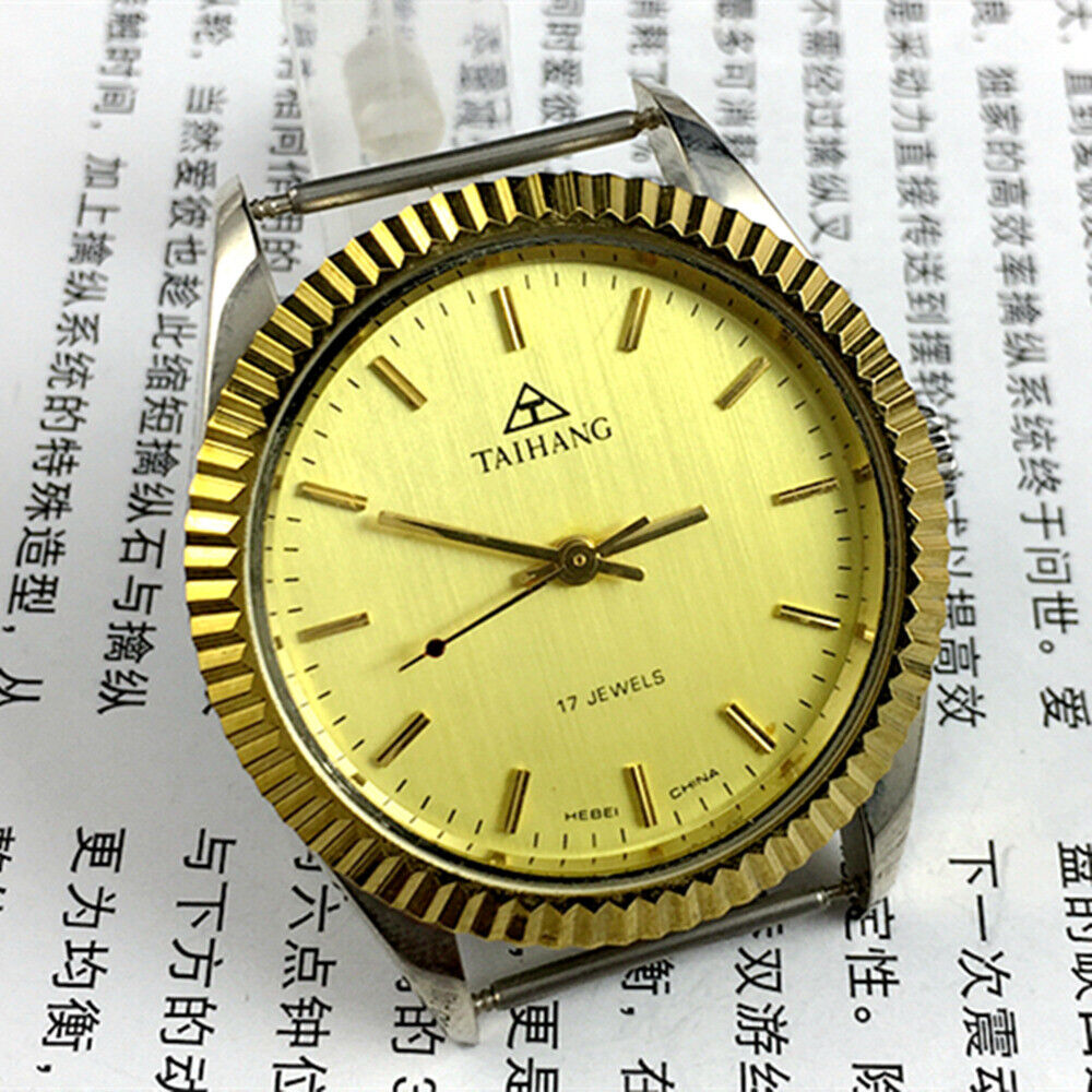 TAIHANG 38mm manual mechanical watch with golden dial, round case, and 17 jewel movement