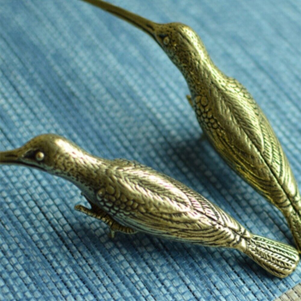 Solid copper Woodpecker trinket with hand-carved bronze details, perfect for rustic decor.