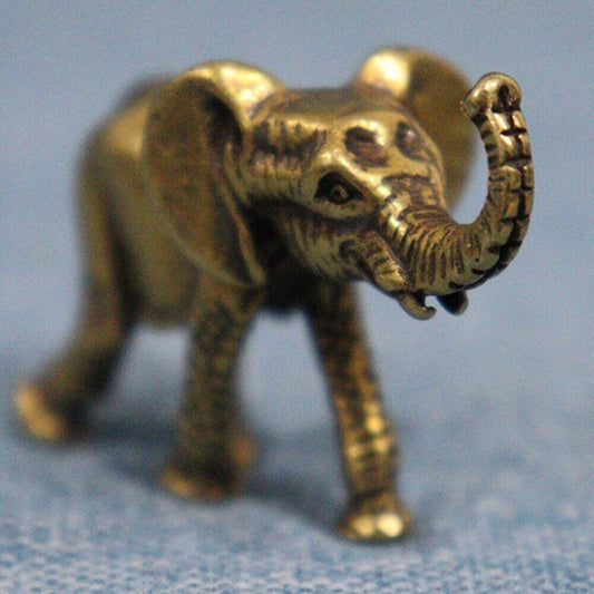 Hand-carved solid copper elephant trinket, vintage bronze model figurine for decor.