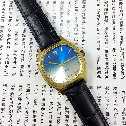 33mm Shanghai manual mechanical watch with blue dial, golden nails, square case, and 17 jewels.