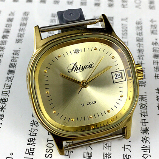 33mm China-made manual mechanical watch with golden dial and square case, elegant single calendar display.