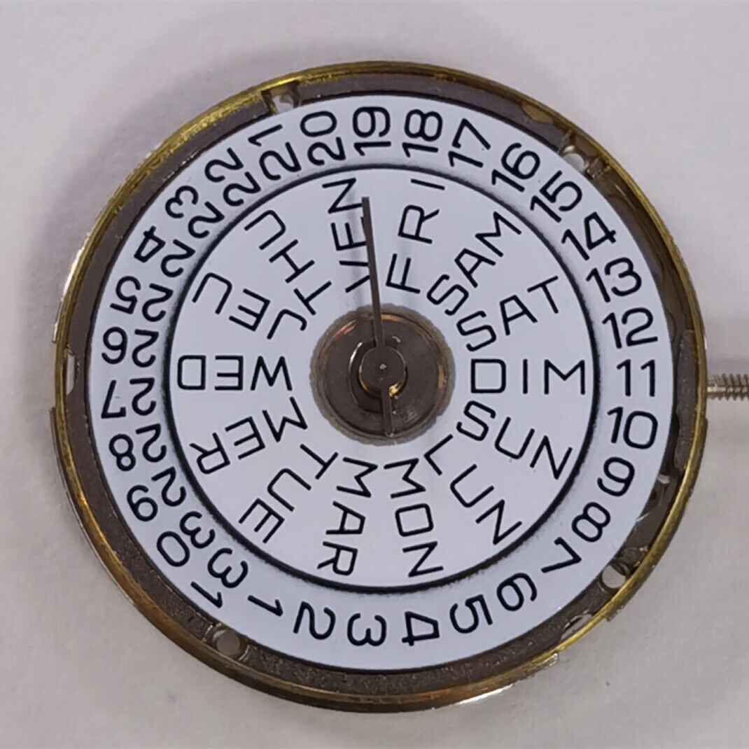 1. 7022 7020B quartz watch movement by ETA, showing day and date display replacement.  