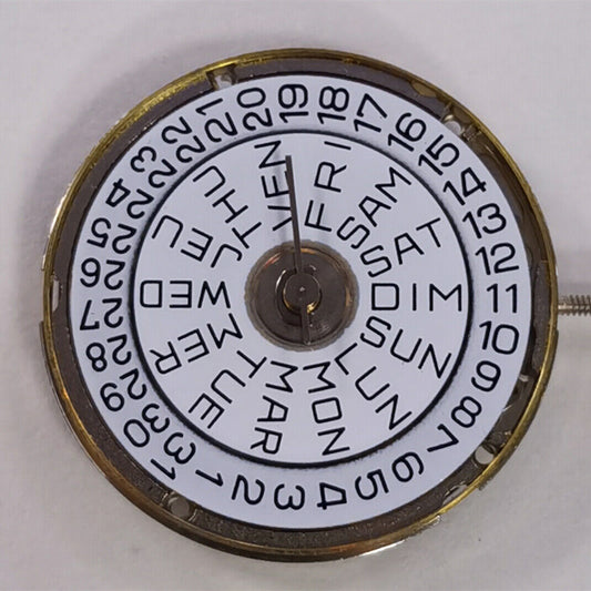 1. 7022 7020B quartz watch movement by ETA, showing day and date display replacement.  