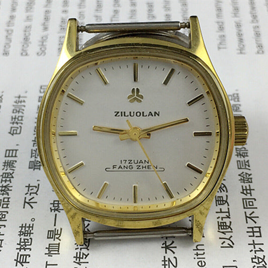 17 Jewels Chinese manual mechanical watch with golden nails, silver dial, shock-resistant design.