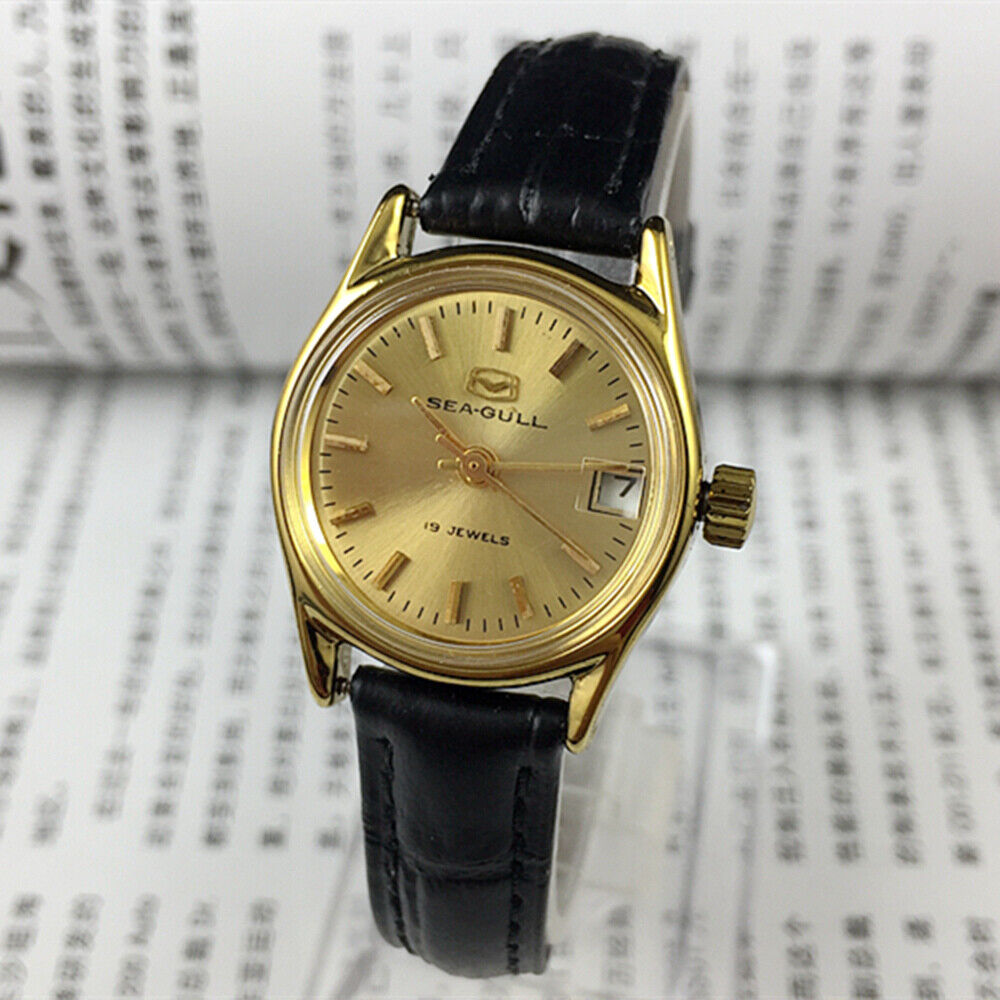 Round gold case ladies watch with single calendar, Seagull manual mechanical movement, elegant design.
