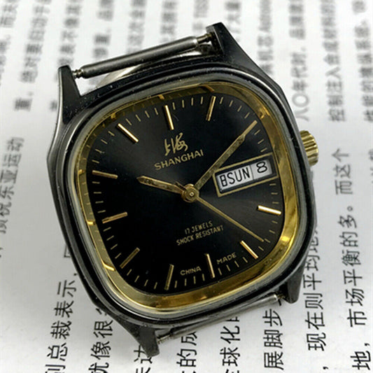 33mm Shanghai Factory manual mechanical watch with double calendar, black dial, classic design.