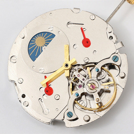 Asian Dandong silver watch with date and moon phase at 3 and 9 o'clock, automatic mechanical movement.