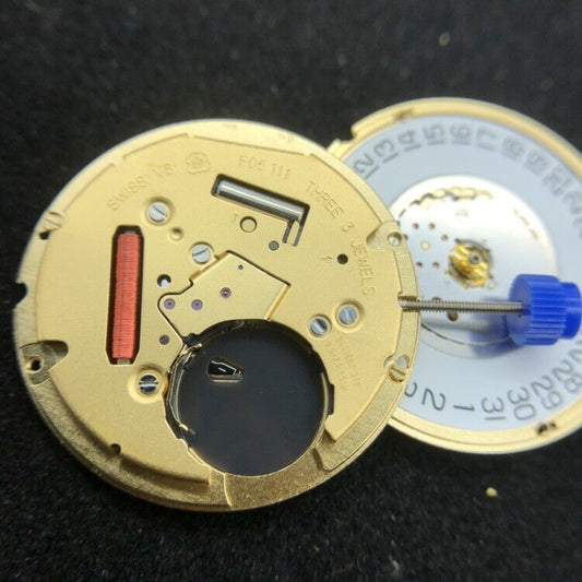 ETA F06.111 Swiss quartz watch movement with 3 hands and date at 3 o'clock.