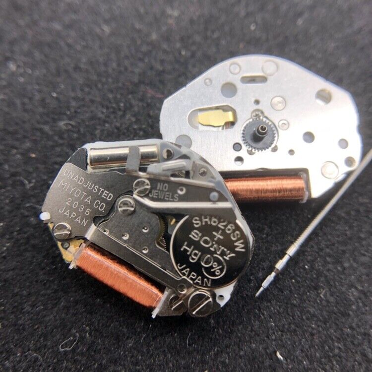 Miyota/Citizen silver quartz movement 2036 with watch stem, Japan-made precision part for watch repairs.