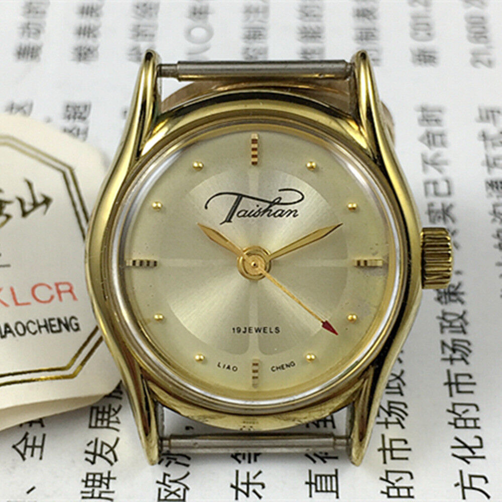 Elegant 27mm TAISHAN manual mechanical lady watch with 19 jewel movement and golden accents from Liaocheng, China.