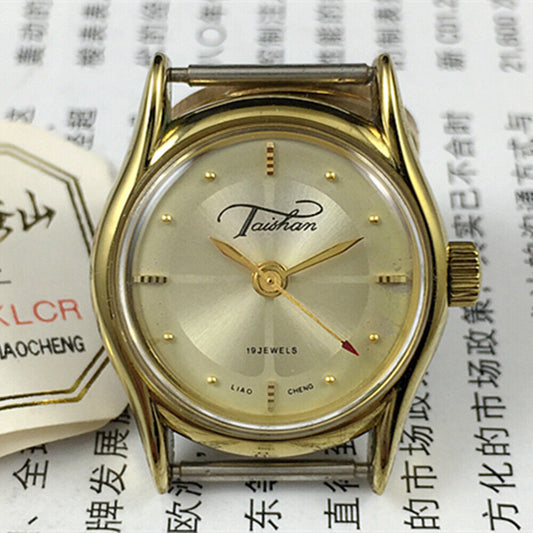 Elegant 27mm TAISHAN manual mechanical lady watch with 19 jewel movement and golden accents from Liaocheng, China.