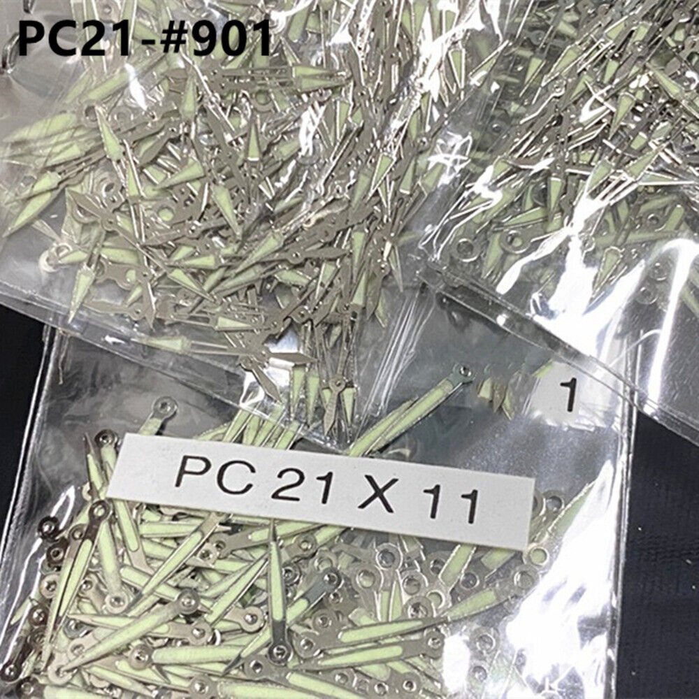 1. Set of 11mm green luminous watch hands by Hattori Epson for PC21 quartz movements.  