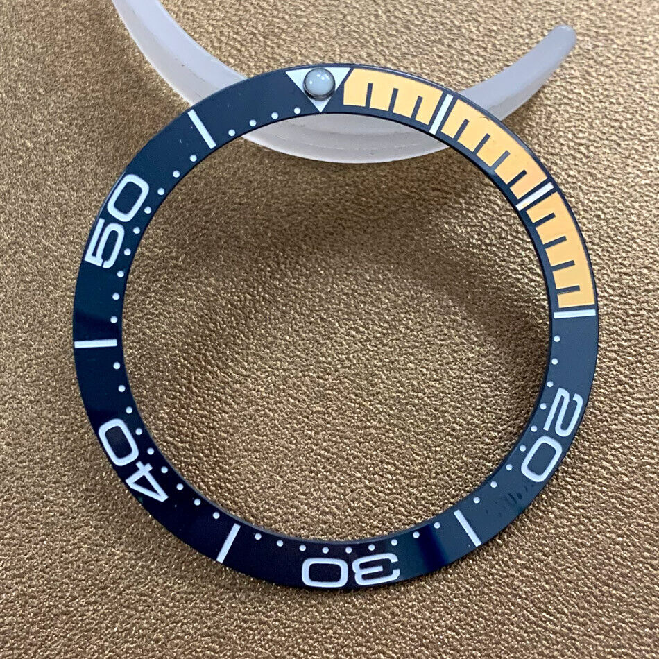 Orange and dark blue ceramic bezel insert for 38mm/30.8mm watch, durable replacement part.