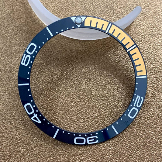 Orange and dark blue ceramic bezel insert for 38mm/30.8mm watch, durable replacement part.