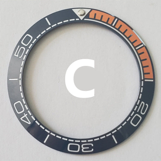 Dark blue ceramic watch bezel insert with orange font, 41.5mm/32.5mm, for watch repairs and customization.