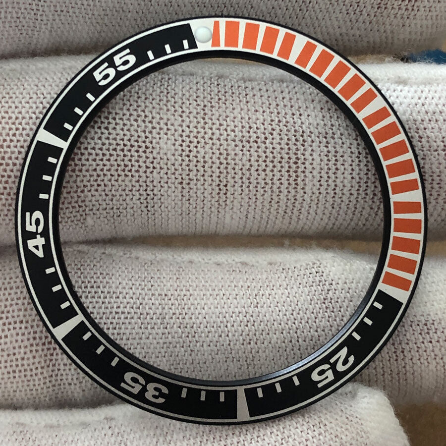 Black and orange Radian aluminum watch bezel insert, 39.9mm/31.6mm, durable replacement part for watch accessories.