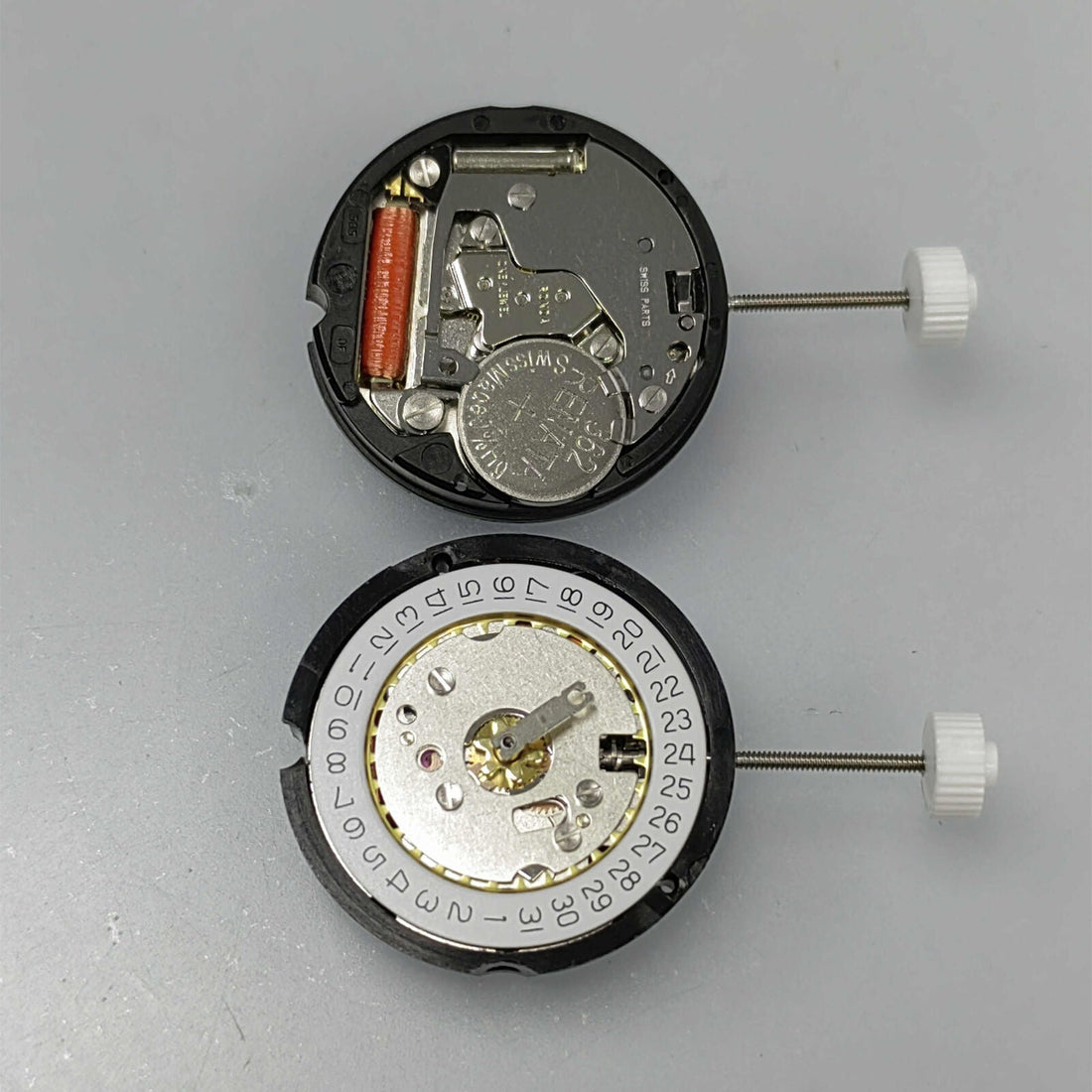 Swiss Ronda 585 quartz watch movement with date display at 3 o?clock, standard height design.
