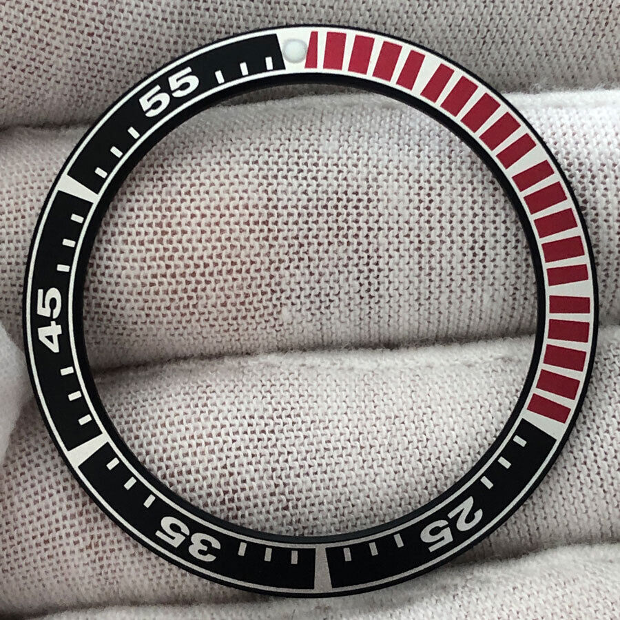 Black 39.9mm/31.6mm aluminum watch bezel insert with red radian detail for precise timekeeping parts.