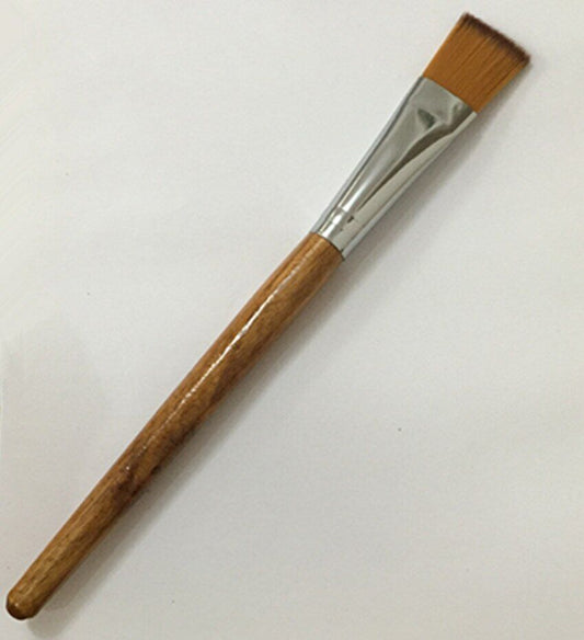 Wooden handle antistatic brush for gentle watch cleaning and repair.