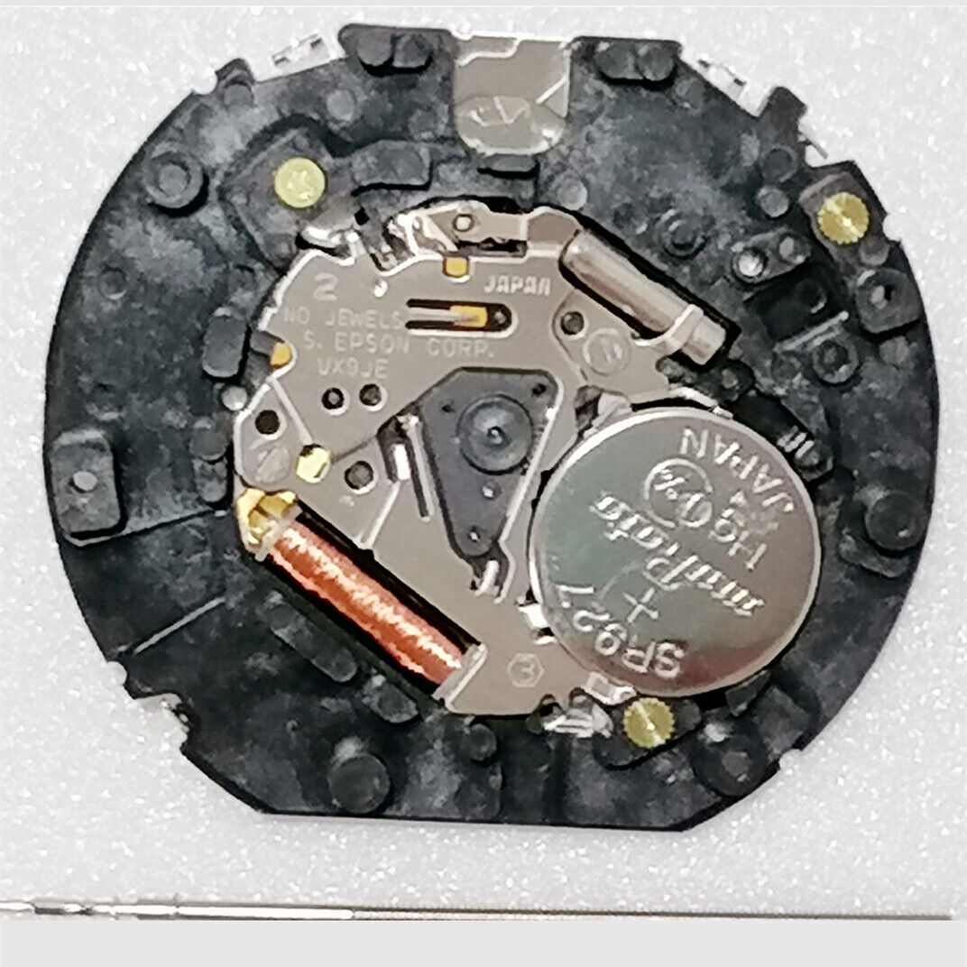 1. Hattori Epson VX9JE quartz watch movement, precision Japan-made component for repairs.  