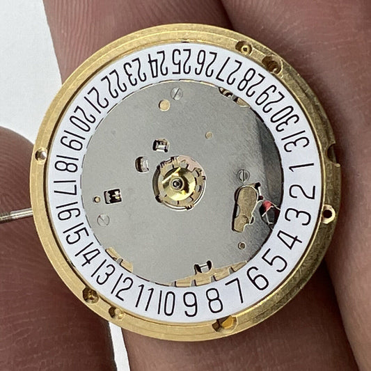 ETA E63.111 Swiss quartz watch movement with 3 hands and date display at 6 o'clock.