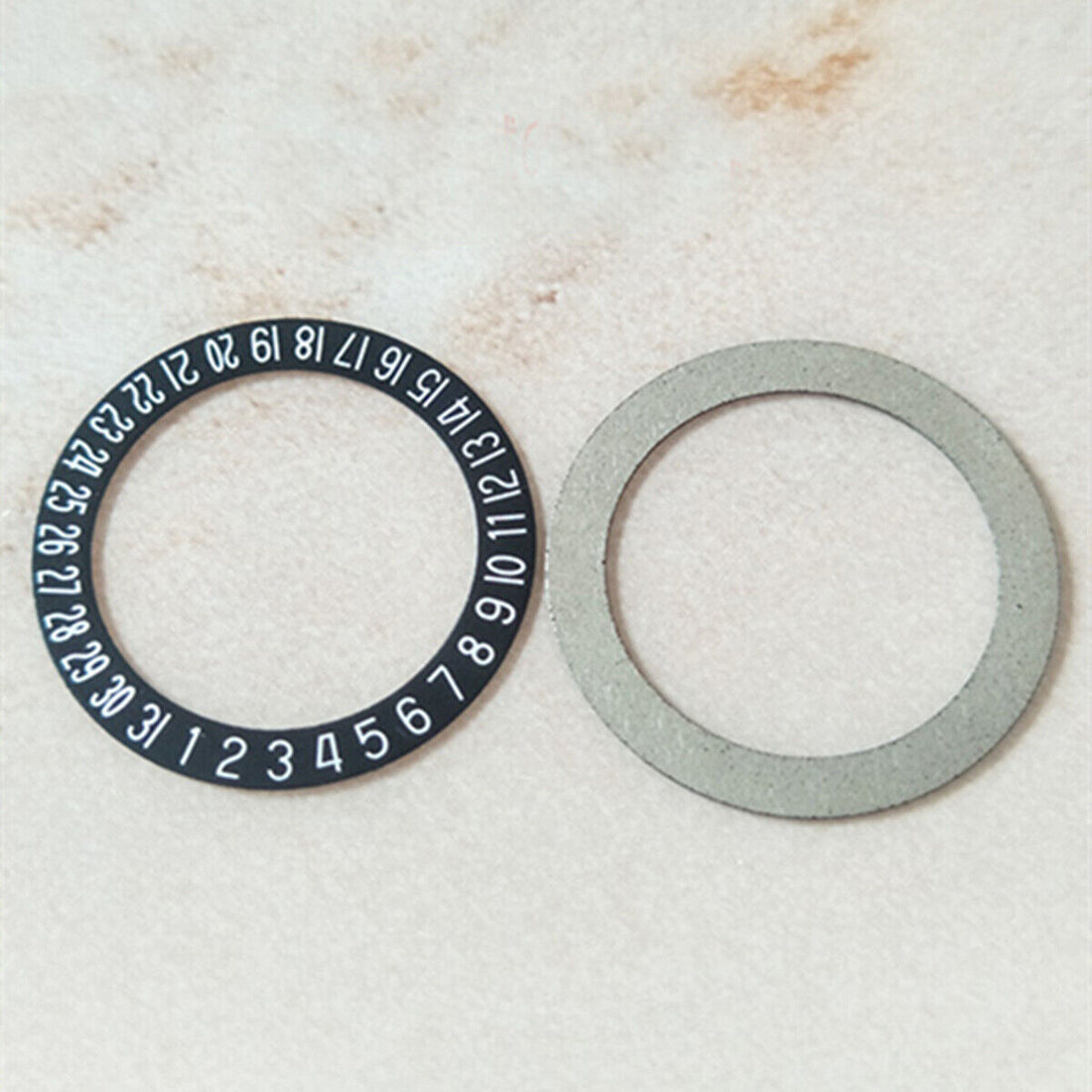 White font date wheel with black overlay for Miyota 8215 watch movement, date window positioned at 6 o'clock.