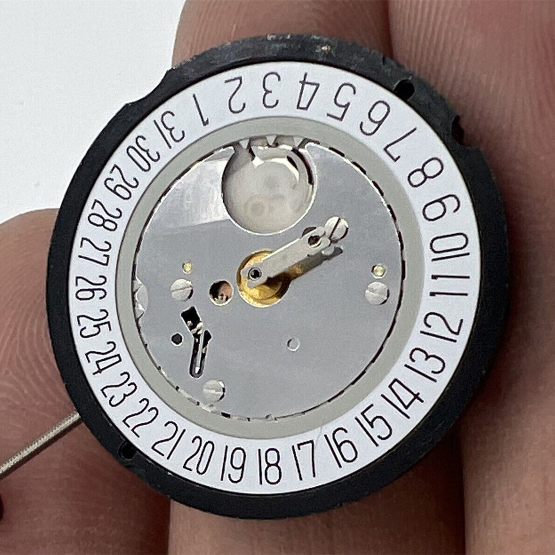 Ronda 515 Quartz watch movement with date at 6, Swiss precision parts for reliable timekeeping.