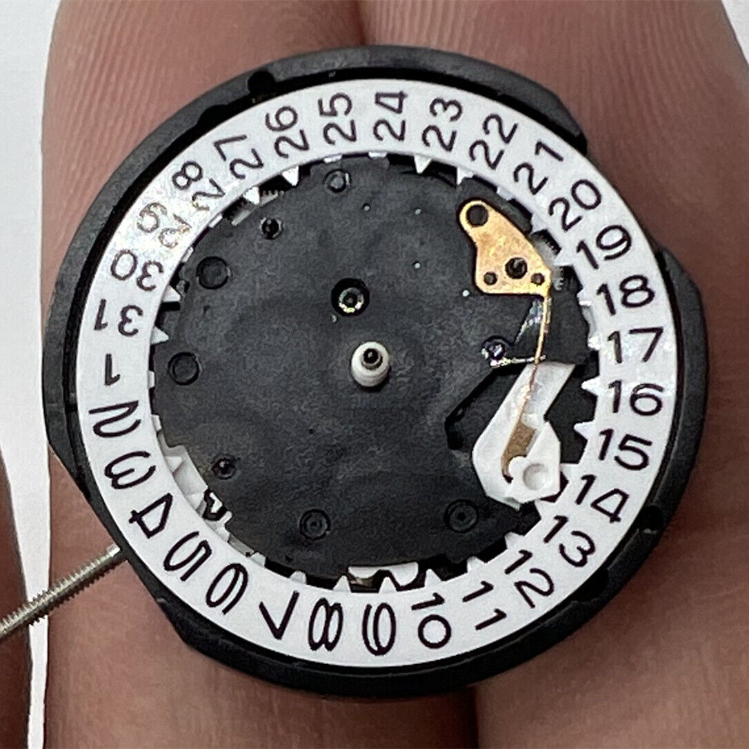 Sunon PE81 quartz watch movement with 3 hands, date at 3, and small seconds at 3, 6, 9 positions.