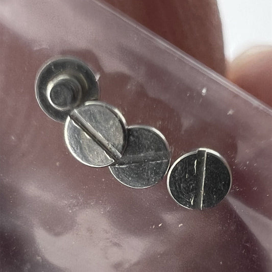 Screws for NH05 NH06 rotor oscillating weight, precision fit for watch movement components.