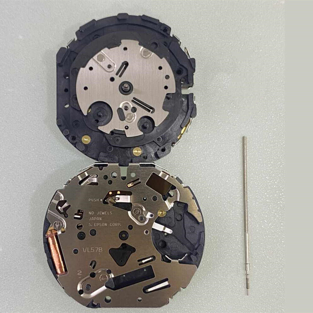 Hattori Epson VL57A quartz watch movement, precision Japan-made mechanism for accurate timekeeping.