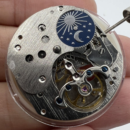 China Made watch accessory featuring automatic mechanical movement, small second at 10 o'clock, and moon phase at 2 o'clock for precision timekeeping.