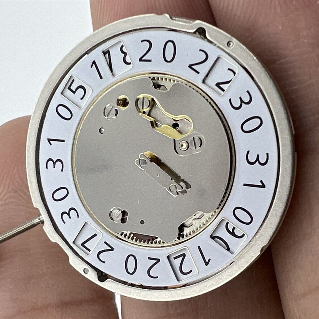 Ronda 6004B quartz watch movement with date at 12, Swiss precision for watch repairs