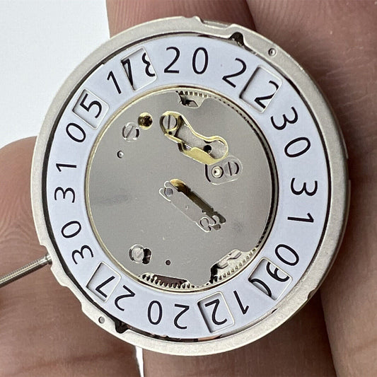 Ronda 6004B quartz watch movement with date at 12, Swiss precision for watch repairs