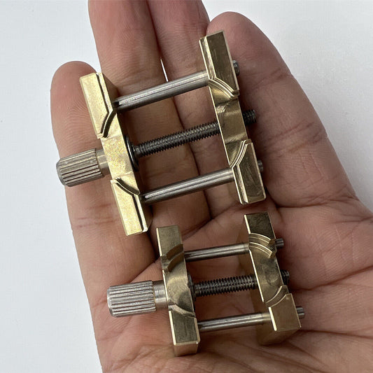Copper vintage 2PCS watch movement holder clamp vise, ideal for precise watchmaker repairs.