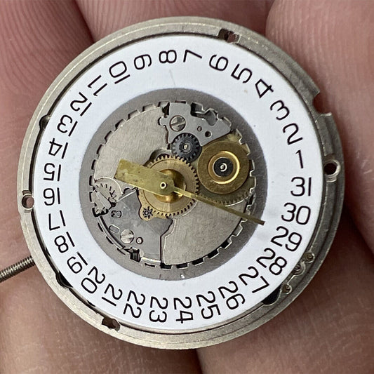 ETA 955.414 Swiss-made quartz watch movement with date display at 3 o?clock, reliable precision.