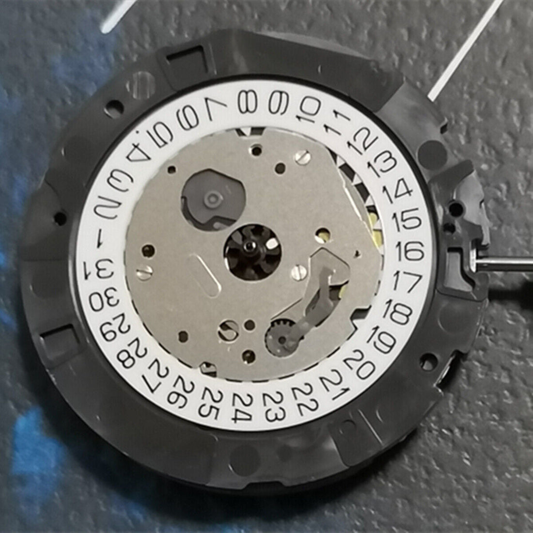 Japan-made Miyota OS20 quartz watch movement with date display at 4:30, ideal for watchmakers.