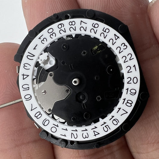 Sunon PE90 Quartz watch movement with 3 hands, date at 3, small seconds at 3, 6, and 9 positions.